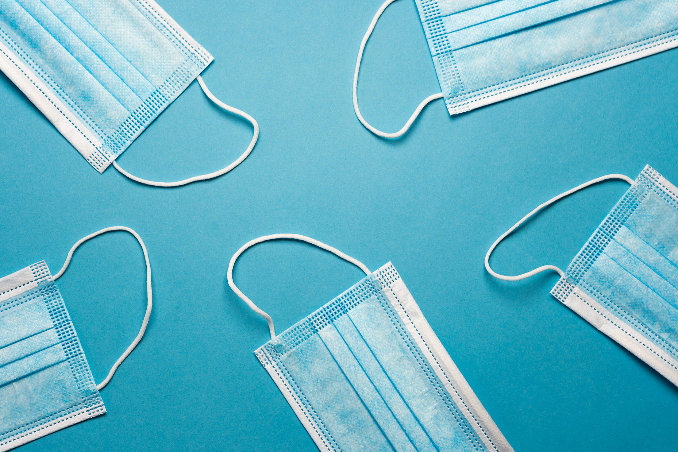 face masks on a blue background free photo 2210x1473